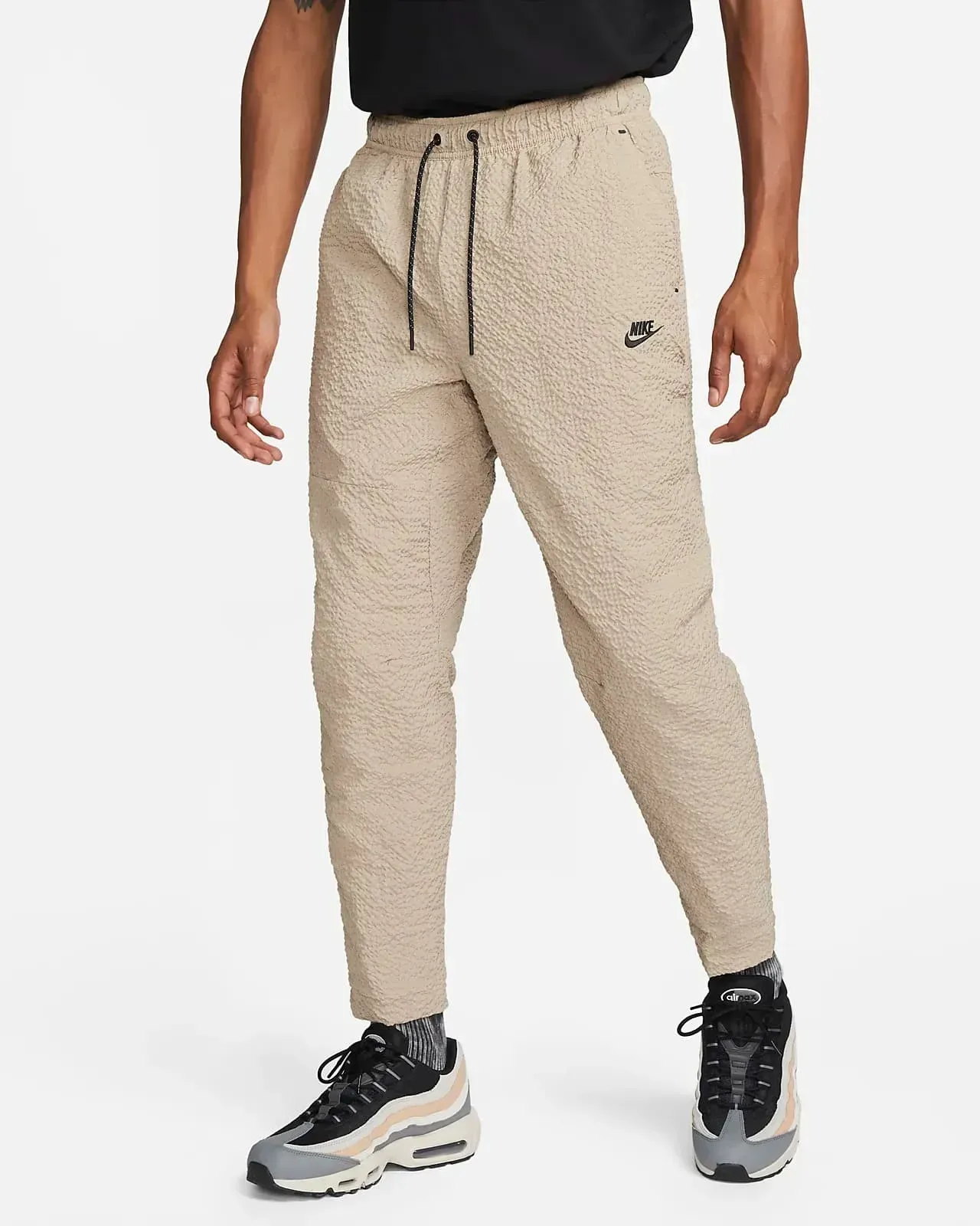 Брюки чоловічі Nike M Nsw Te Lnd Wvn Jggr Snl (DQ4324-247)