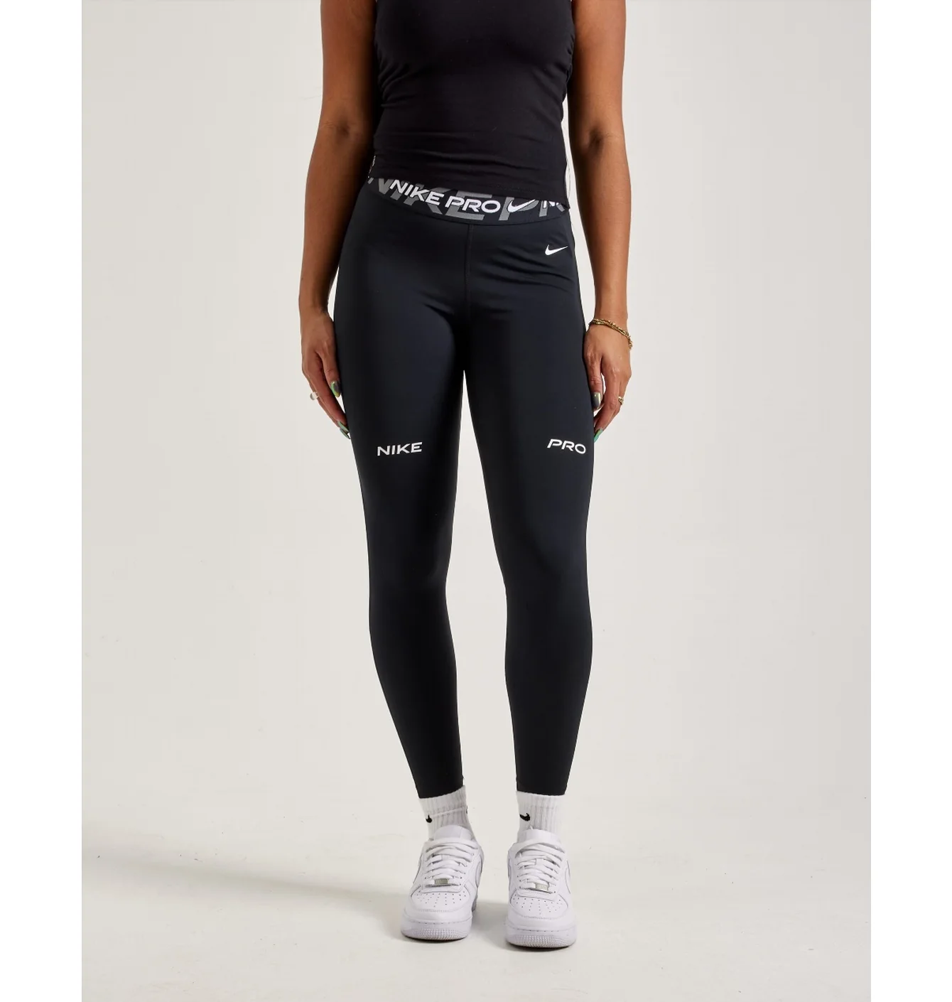 Легінси жіночі Nike Pro Mid-Rise Graphic Leggings Black FV7397-010