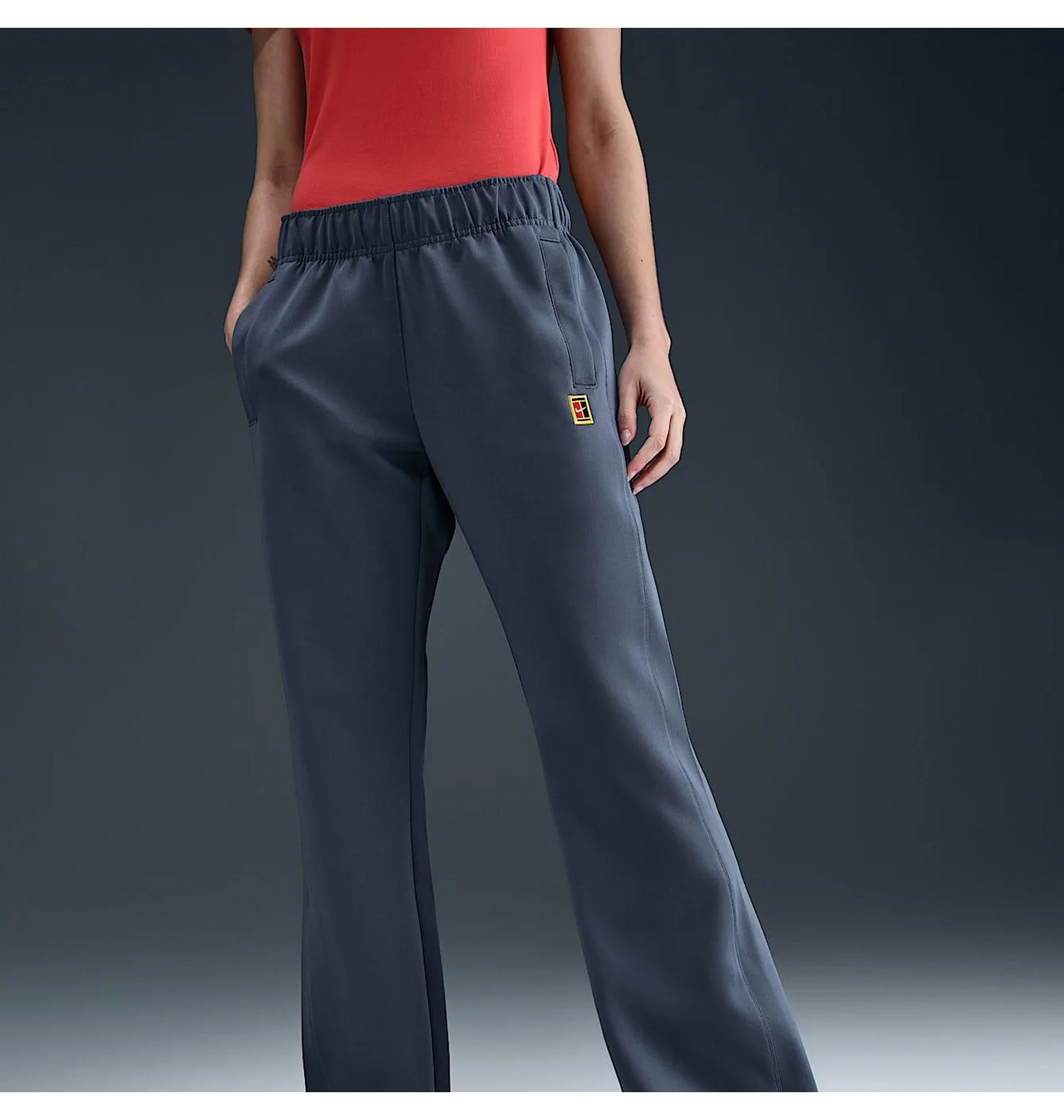 Штани жіночі Nike Court Heritage Windrunner WomenS Mid- Rise Tennis Trousers Blue FZ6509-415
