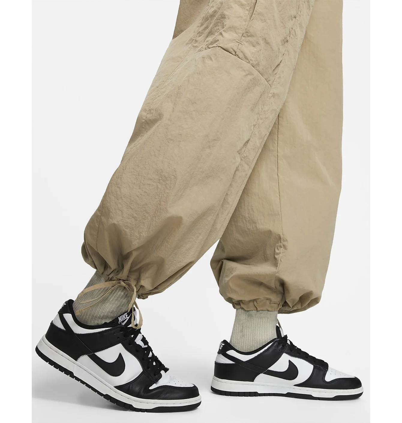 Штани жіночі Nike Wvn Os Pant Hr Sw Beige FJ4934-247