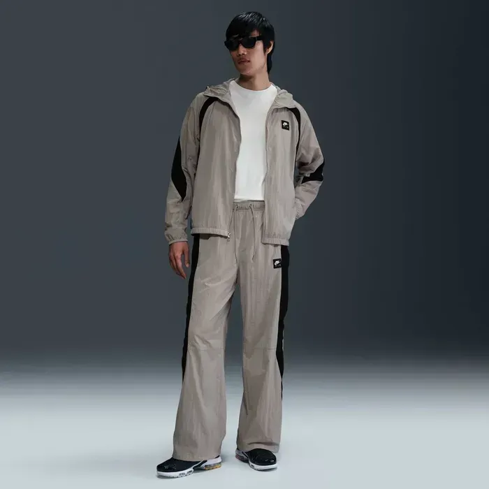 Брюки чоловічі Nike Air Men's Woven Trousers (HJ0285-008)