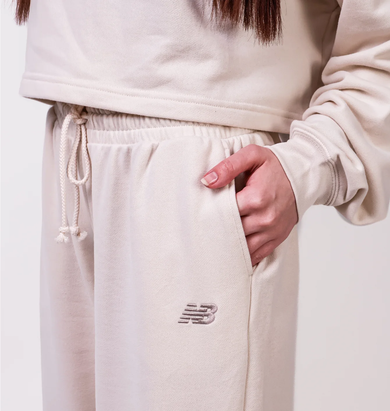 Штани жіночі New Balance Coastal Fleece Beige WP51503LIN